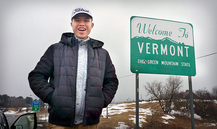 Here is James Peidong posing for a picture after crossing the state border into Vermont.